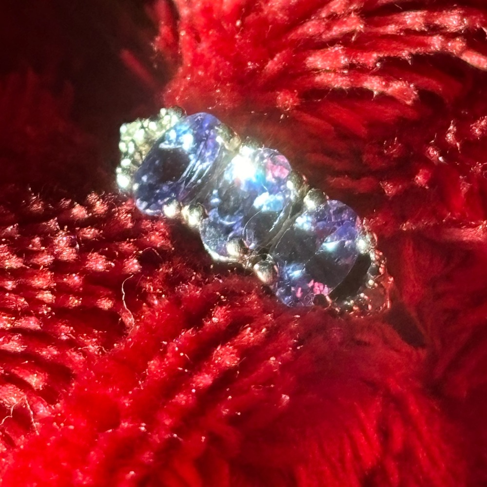 Tanzanite .62CT 3 stone WITH .01CT White Diamond Accents